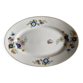 Oval vintage plate in white Limoges porcelain signed T.L.B flowers.