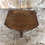 Old vintage wooden tripod milking stool
