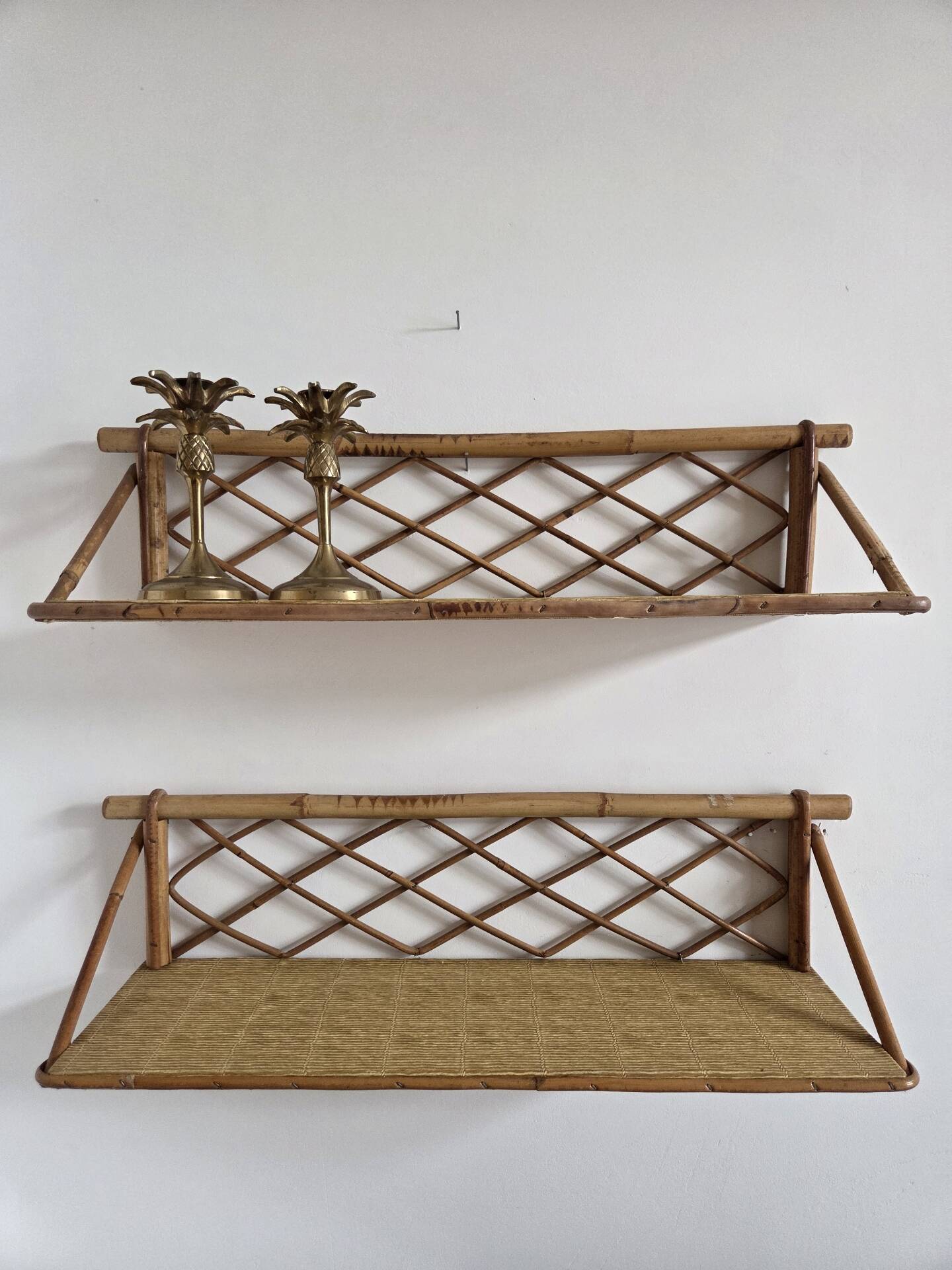 Pair of rattan shelves, 1950s/60s