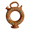 Circular glazed terracotta gargoulette