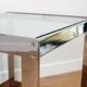 A vintage mid-century glass and rosewood side table by Merrow Associates
