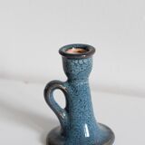 Antique candle holder in glazed ceramic