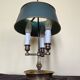 Three-light bouillotte lamp in gold metal, desk lamp.
