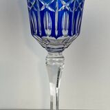 Set of twelve glasses in crystal tinted in different colours and cut with stars.