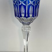Set of twelve glasses in crystal tinted in different colours and cut with stars.