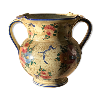 Ancient vase with handles, flower motifs