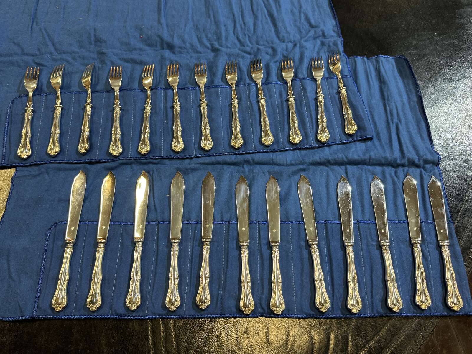 Service of 12 fish knives and 12 fish forks by Mappin and Webb.