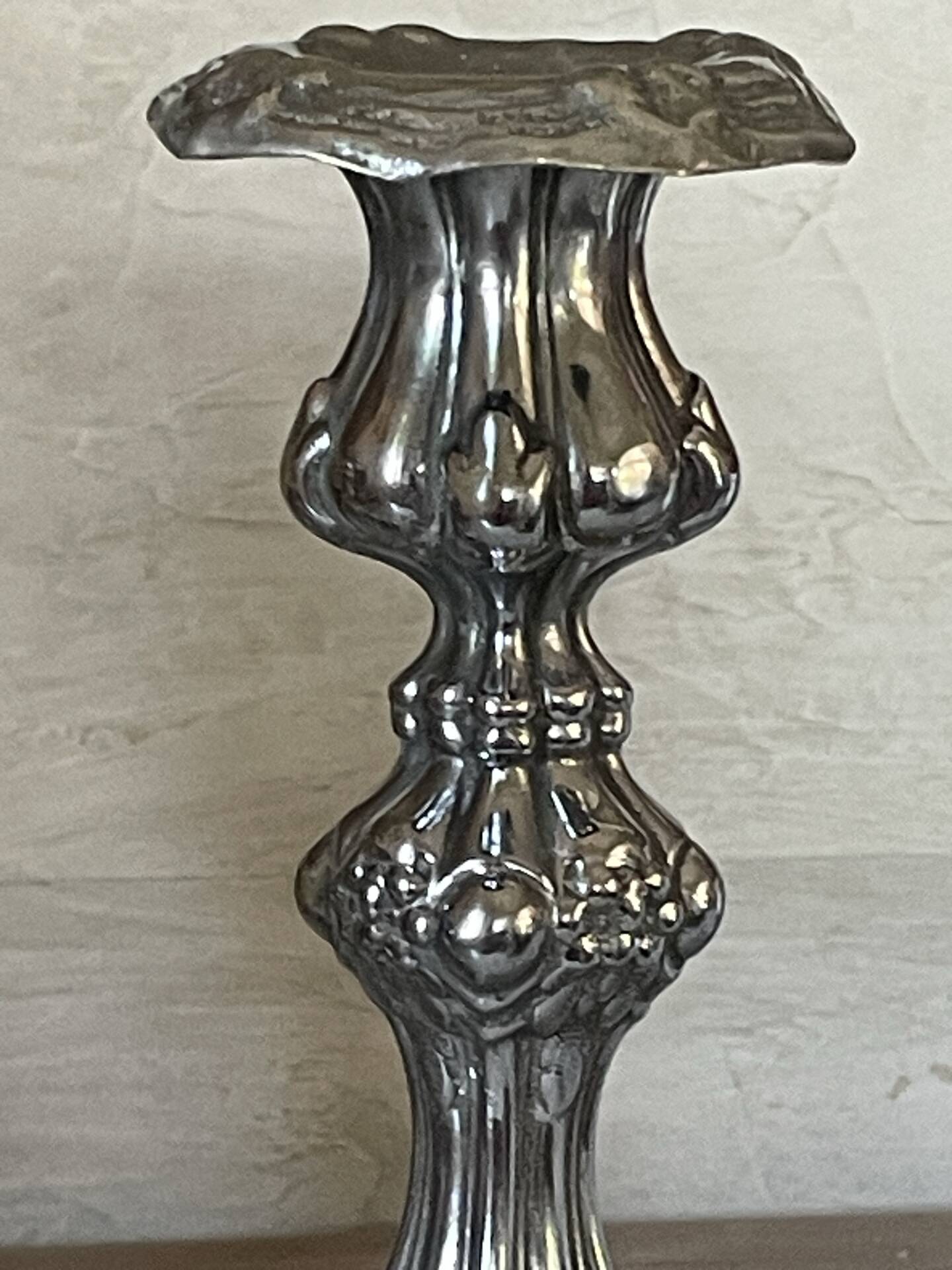 Pair of rococo silver-plated candlesticks