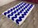 Tapis en laine naturelle bleue fait main