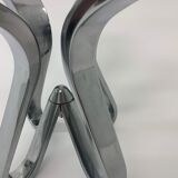 A chromed metal candle-holder "Chorus", design Karim Rashid, executed by Umbra / USA 2002