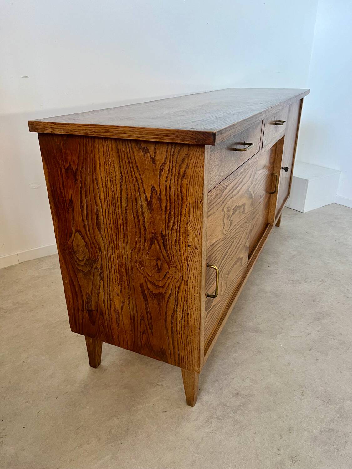 Old oak sideboard from the 1950s, vintage reconstruction period