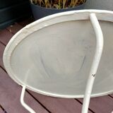 Old white iron garden table