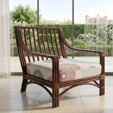 Salon vintage Maison Maugrion en rotin et finitions cuir et plume