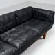 Illum Wikkelso model V11 sofa in black leather by Holger Christiansen, Denmark, 1960