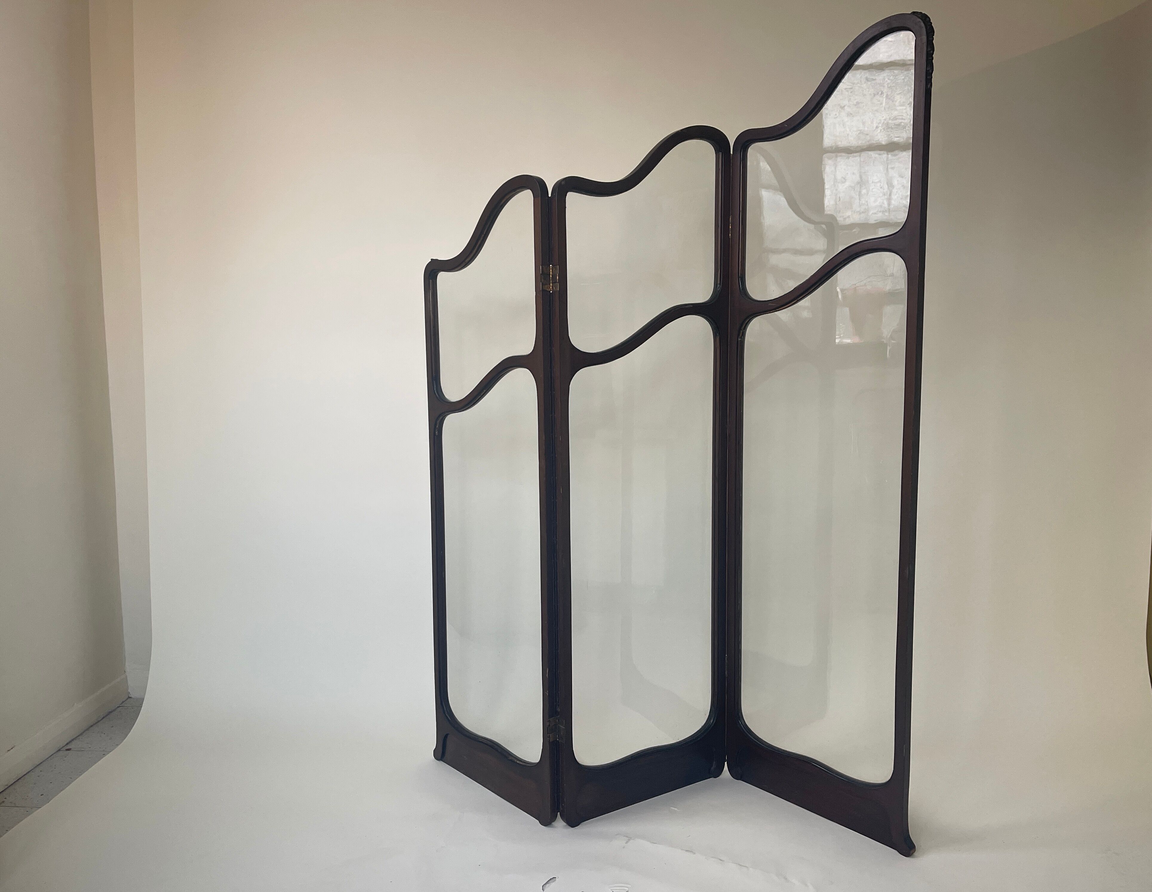 Art nouveau mahogany and glass concertina screen