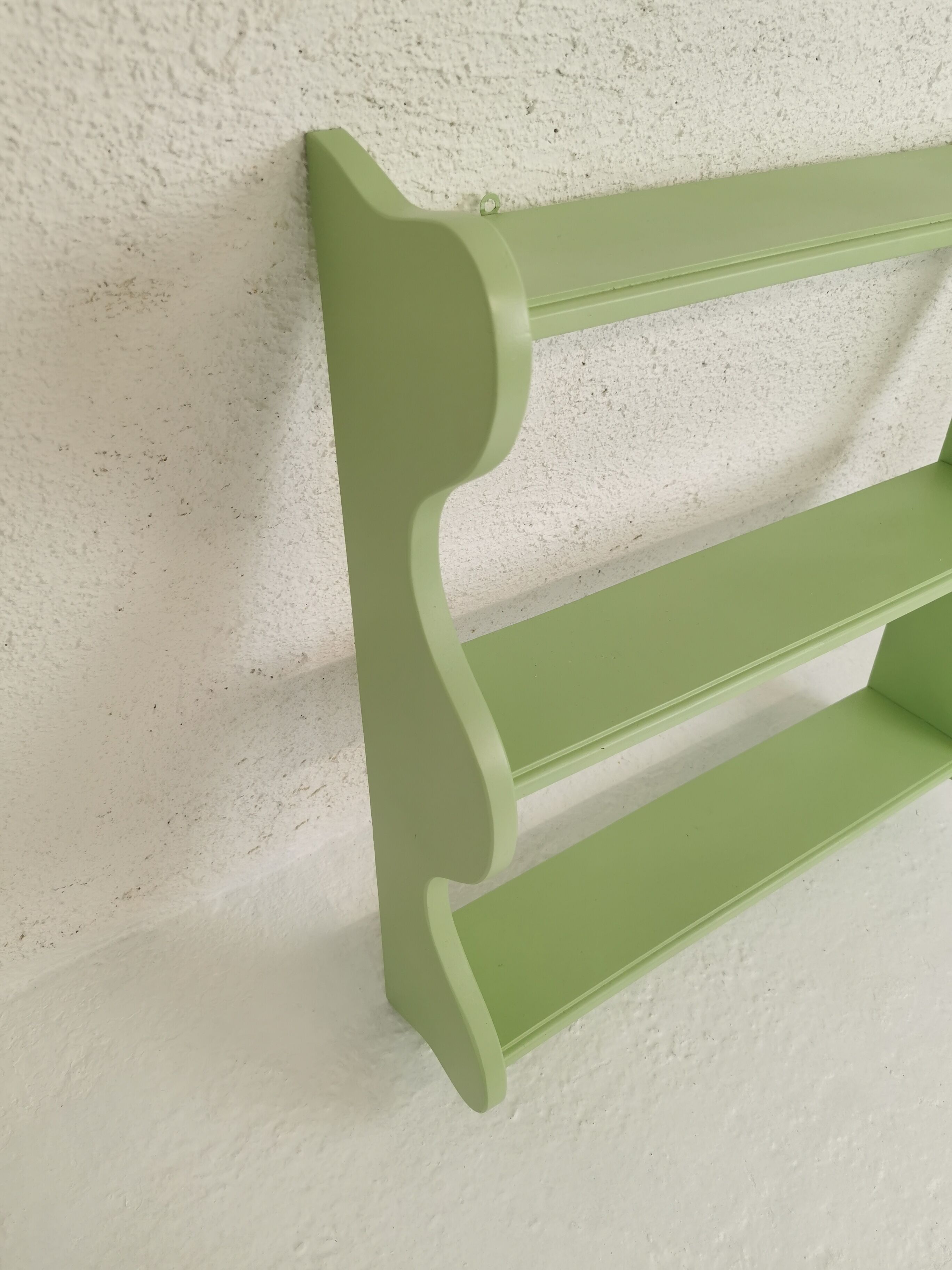 Corrugated wall shelf