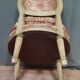 Chaise basse de style Louis XVI