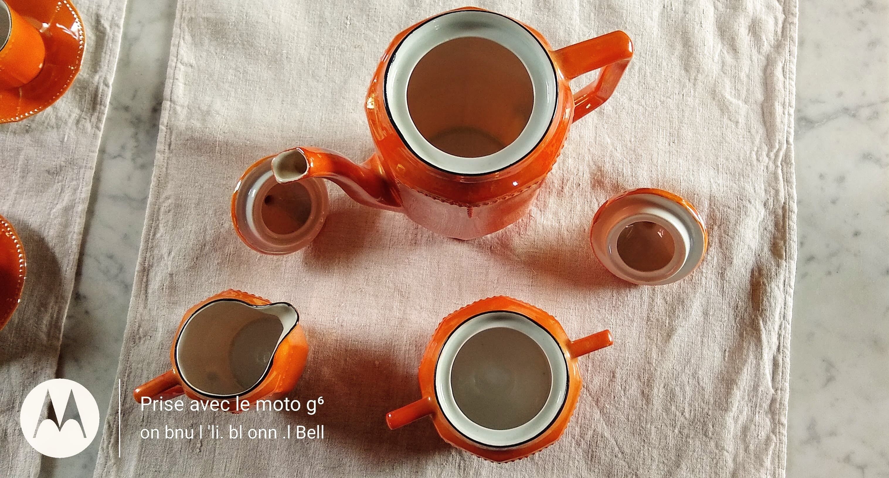 Iridescent orange porcelain coffee set from the 50s-60s with black edging