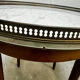 Table basse bouillotte de style Louis XVI