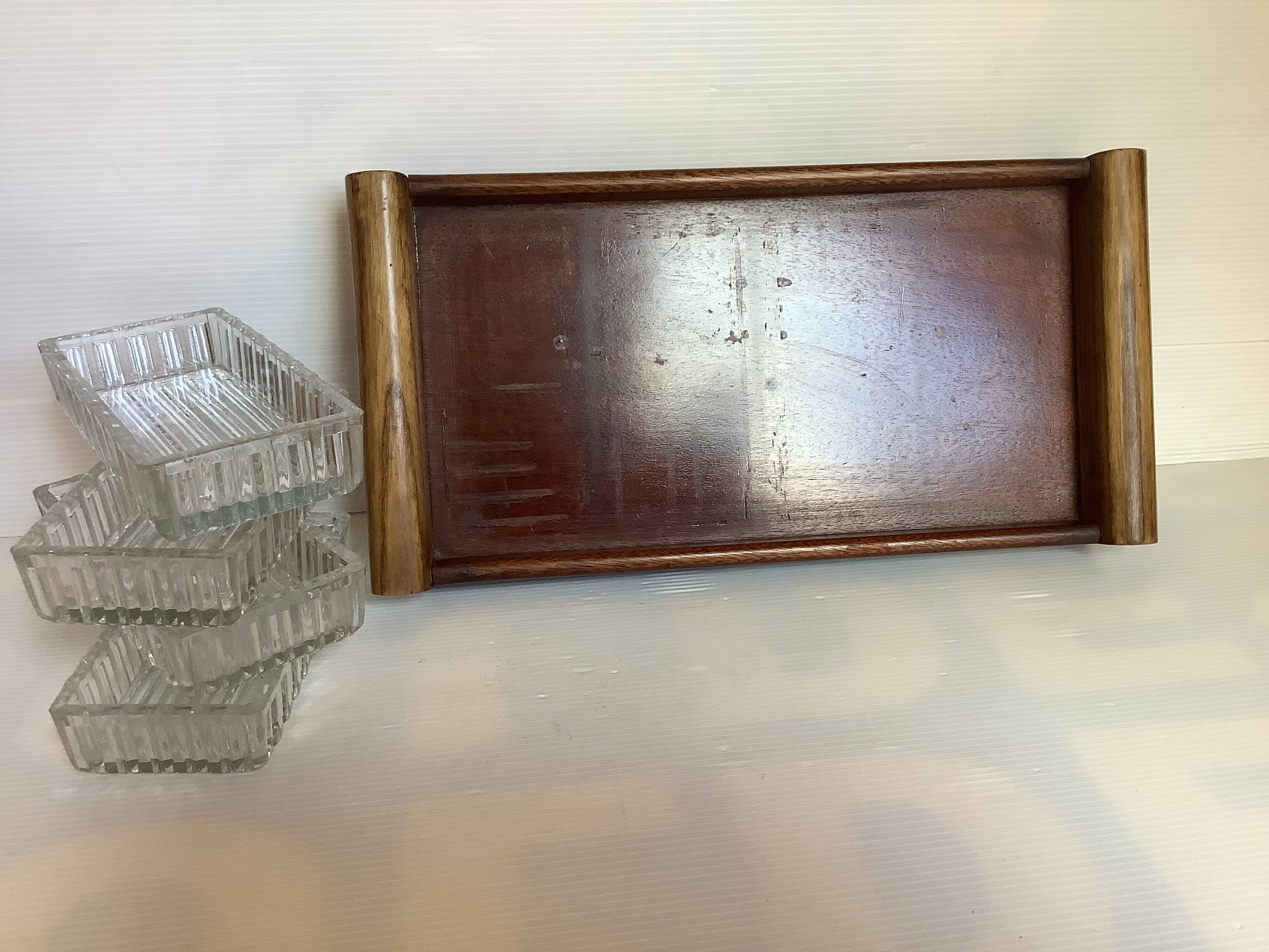 Old wooden serving tray and molded glass bowls