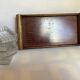 Old wooden serving tray and molded glass bowls