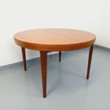 Large vintage Scandinavian round table from the 50s 60s in teak with extensions