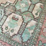 Afghan rug in pastel colors