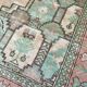Afghan rug in pastel colors