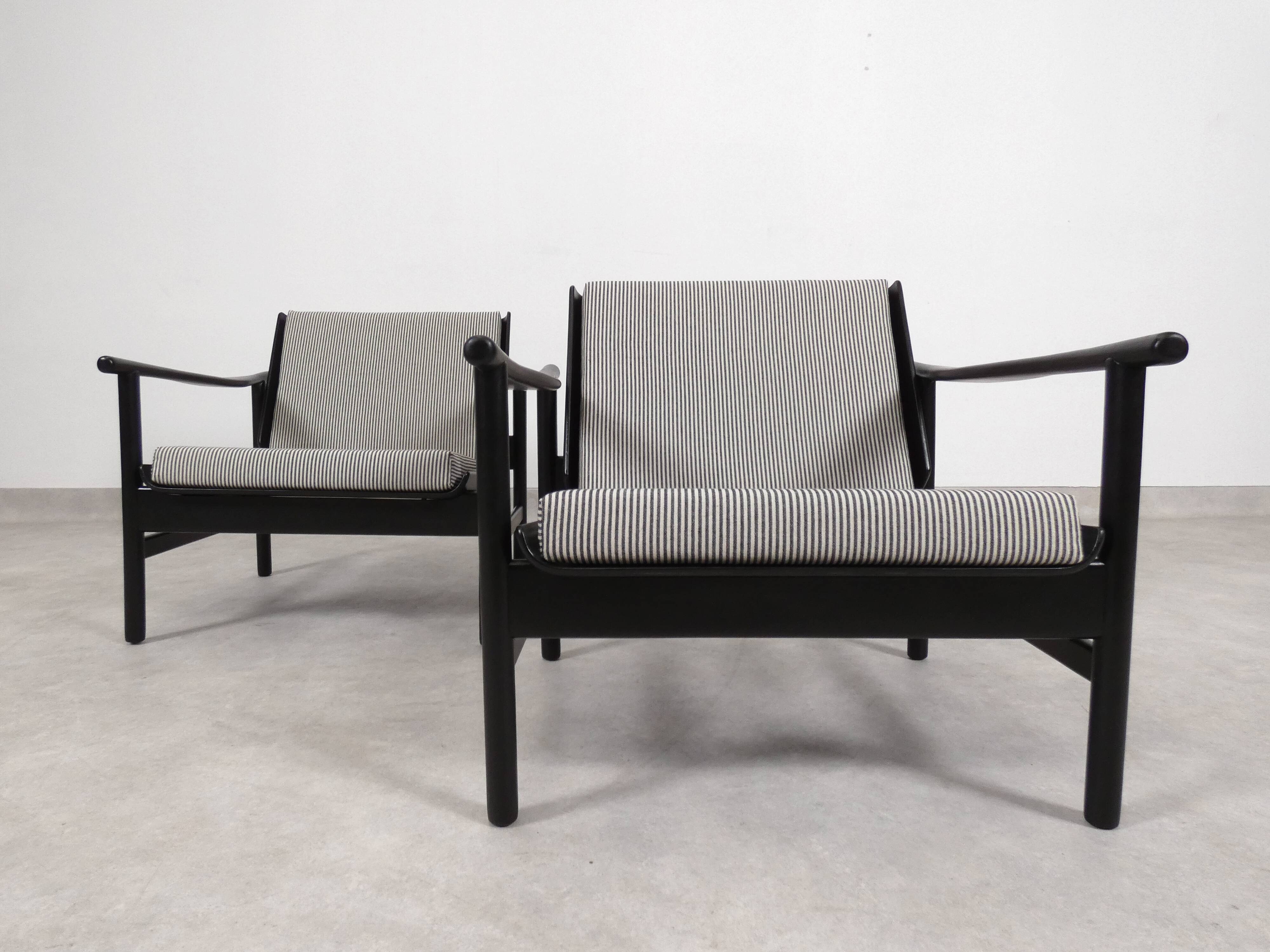 2x wooden Scandinavian arm chairs