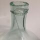 Transparent old demijohn about 8 to 10 L