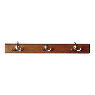 Vintage wooden wall-mounted coat rack with three double hooks
