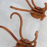 Pair of curved wooden coat racks or hooks from the 1900s