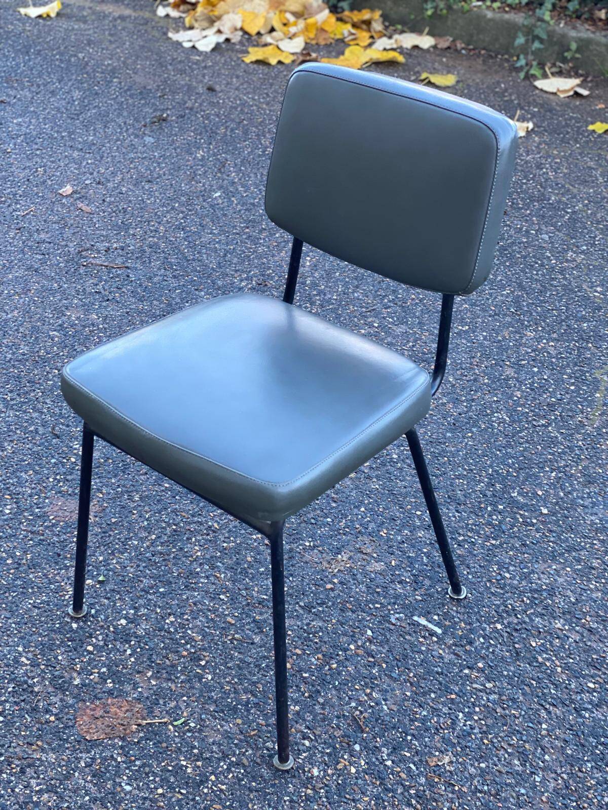 Vintage steel and dark green leather chair from the 60s