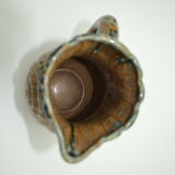 Sandstone pitcher decorated with coils