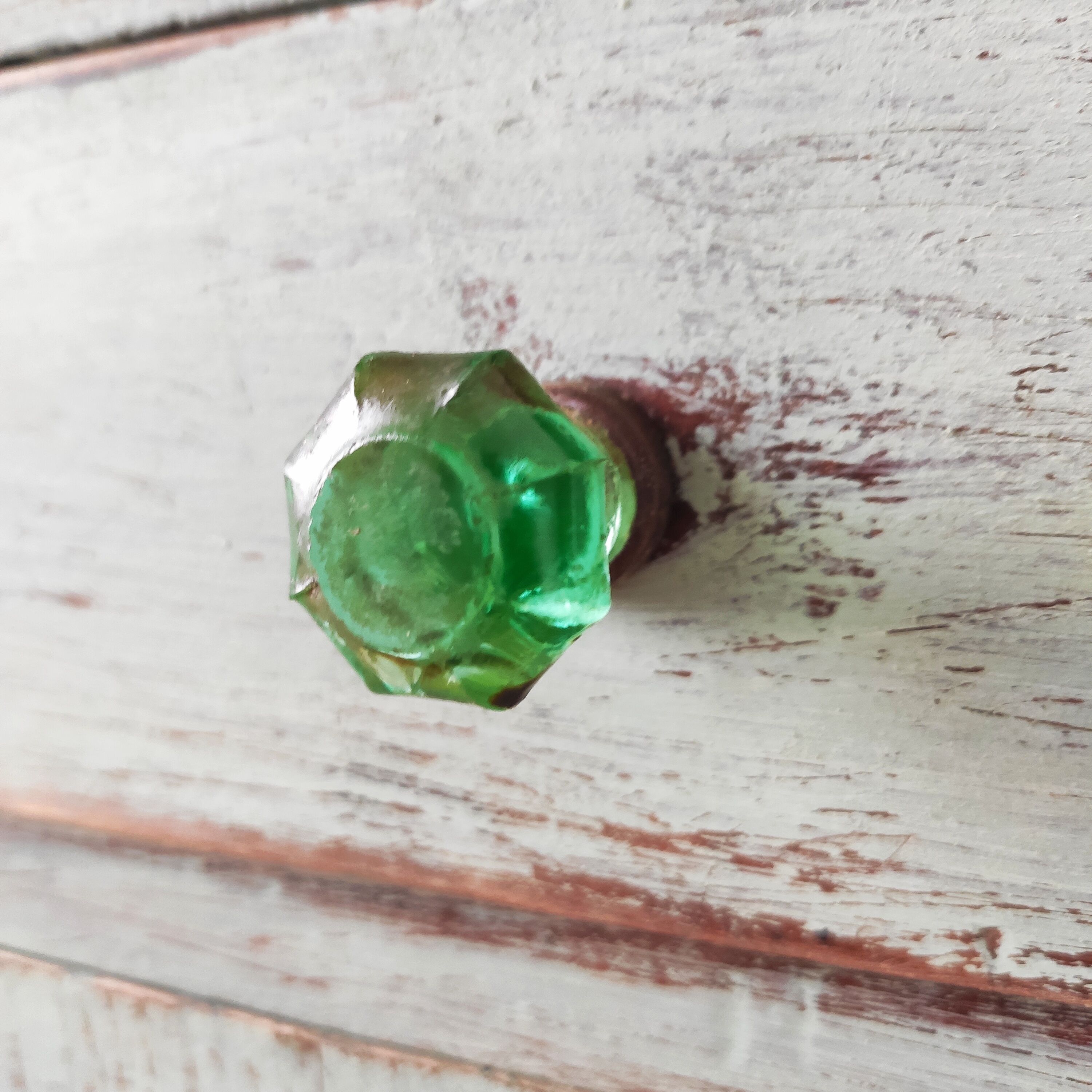 Patinated bedside table end of sofa