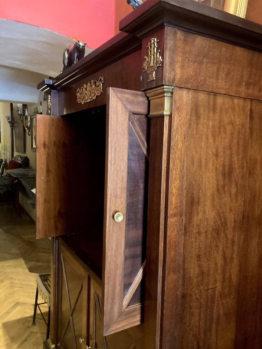 Cabinet, wardrobe or mahogany and ormolu wine bar in French Empire style with four doors.