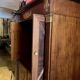Cabinet, wardrobe or mahogany and ormolu wine bar in French Empire style with four doors.