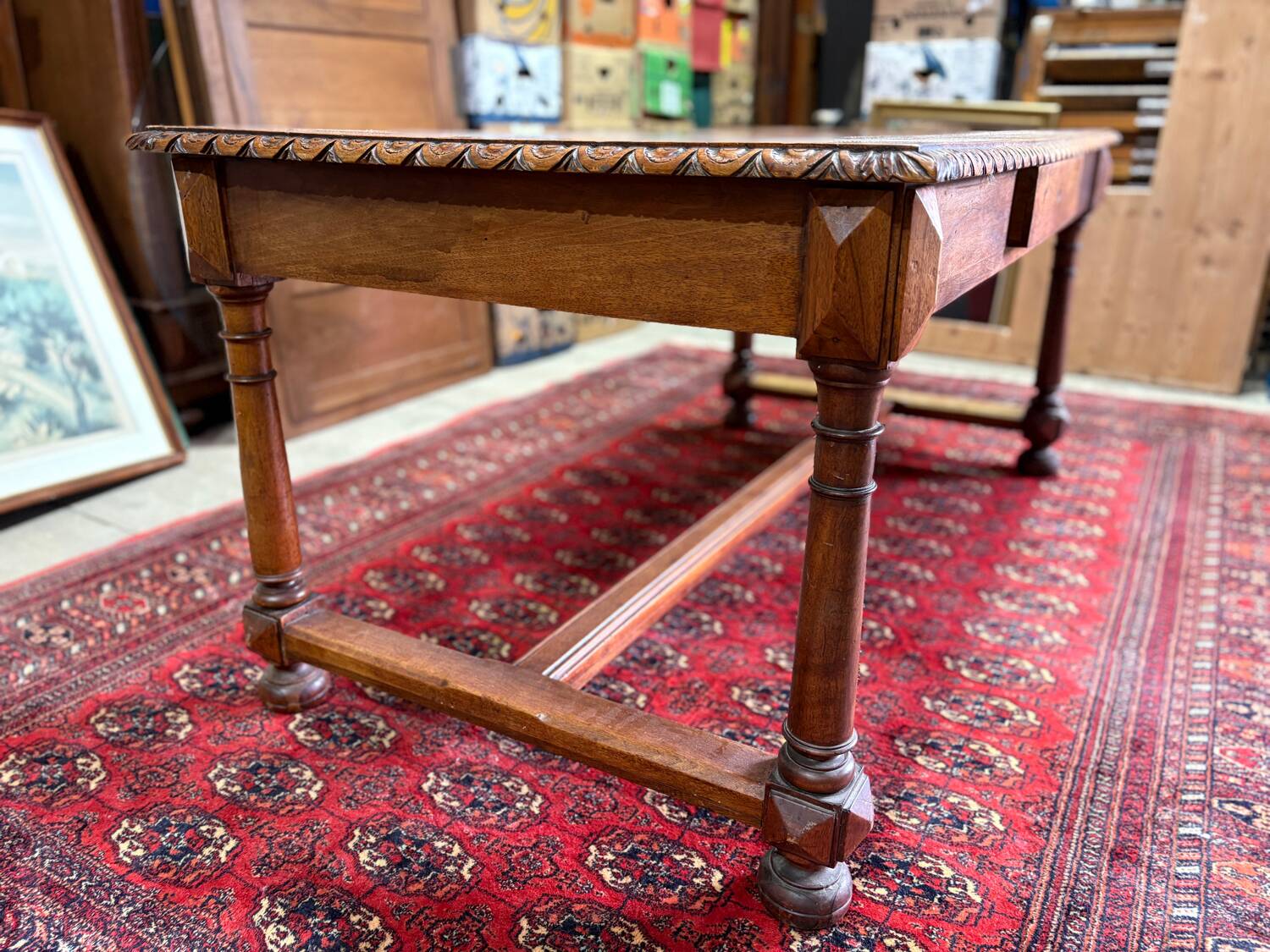 Large antique carved wooden desk in Renaissance style