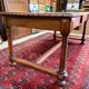 Large antique carved wooden desk in Renaissance style