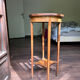Wooden pedestal table with marquetry