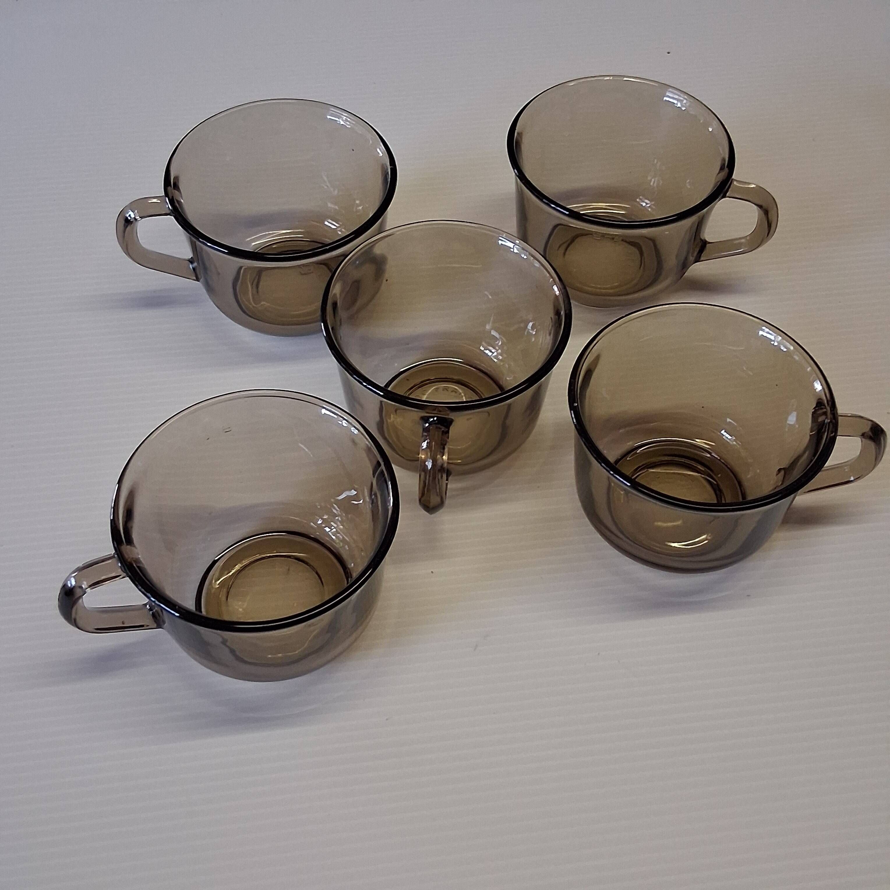 Set of 5 amber black coffee cups from Arcoroc in very good condition.