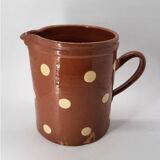 Old pitcher with polka dots savoyard pottery in glazed terracotta alsace