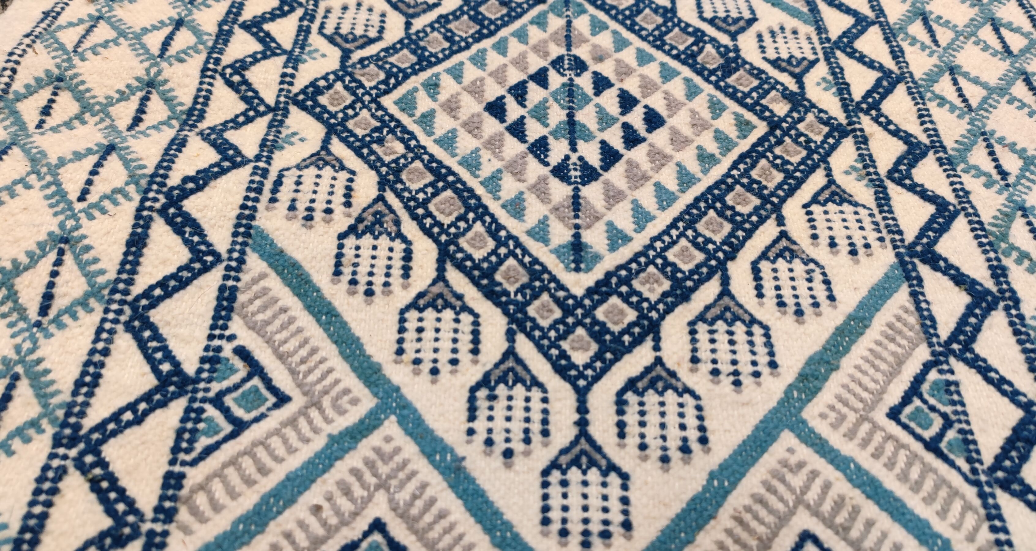 Traditional handmade white blue and gray margoum carpet, 100x72 cm