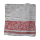 White damask tablecloth. Breve. Large red entourage.