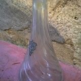 Carafe has grape bunch decoration