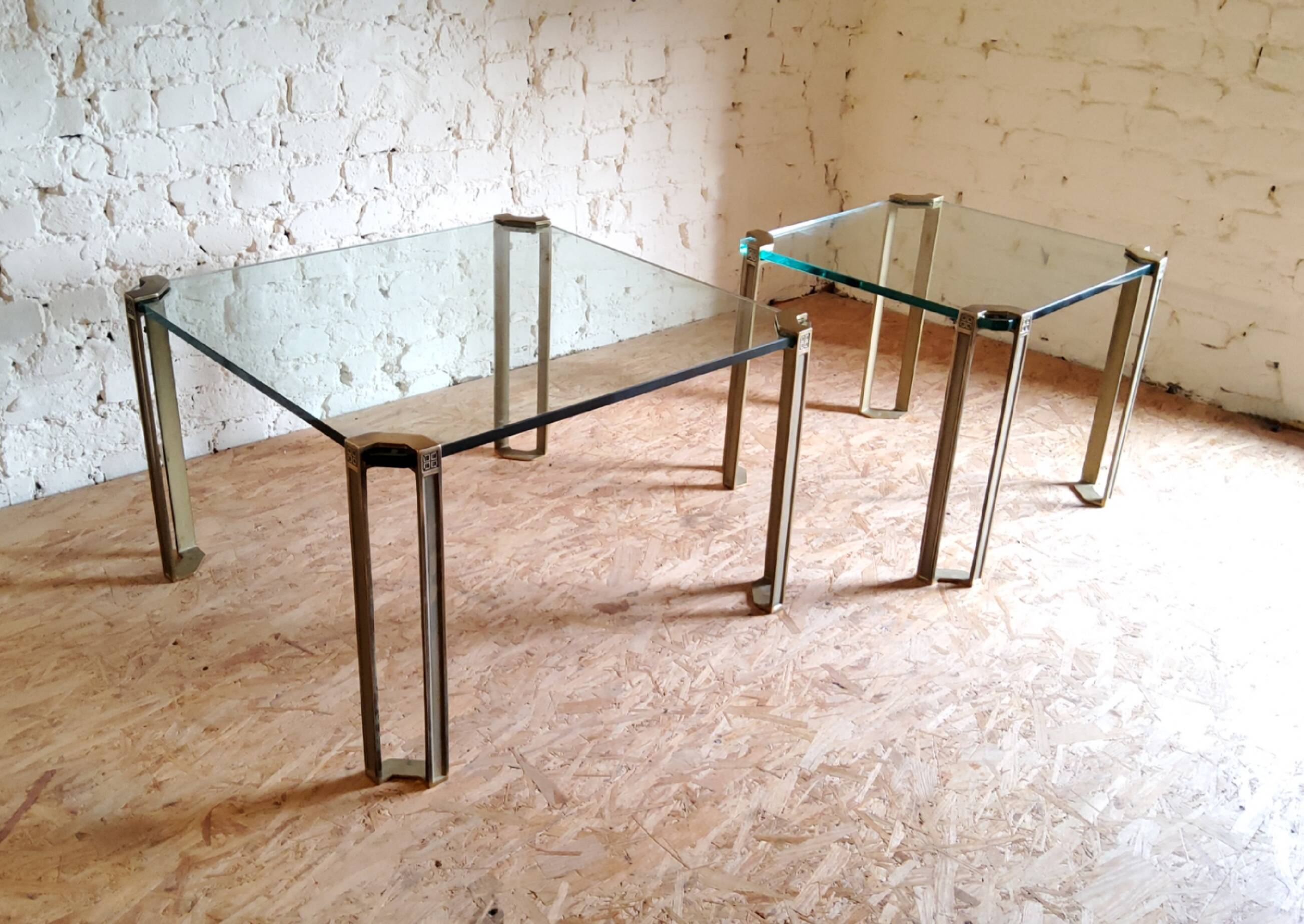 Glass and brass coffee tables by Peter Ghyczy