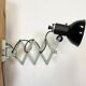Vintage industrial black enamel scissor wall lamp, 1950s