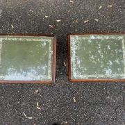 2 side tables, English Regency style, green leather & glass, 1960s.