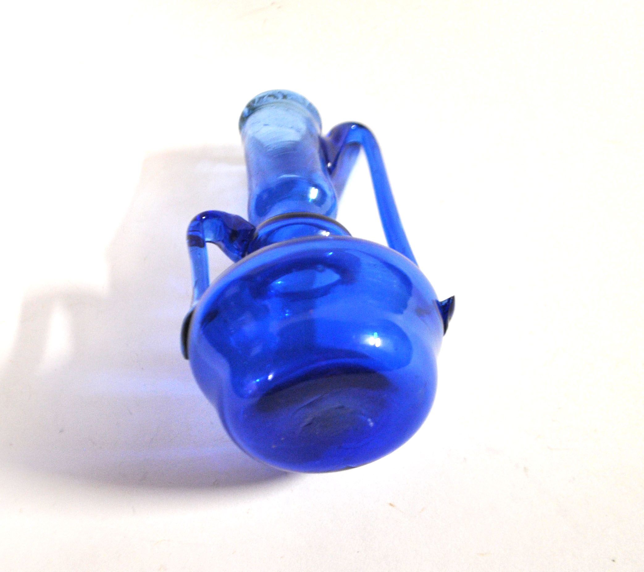 Miniature soliflore vase, antique blown glass in blue, craftsmanship from 1900.