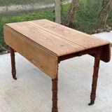 Louis Philippe 19th century square table with shutters in solid oak wood on casters